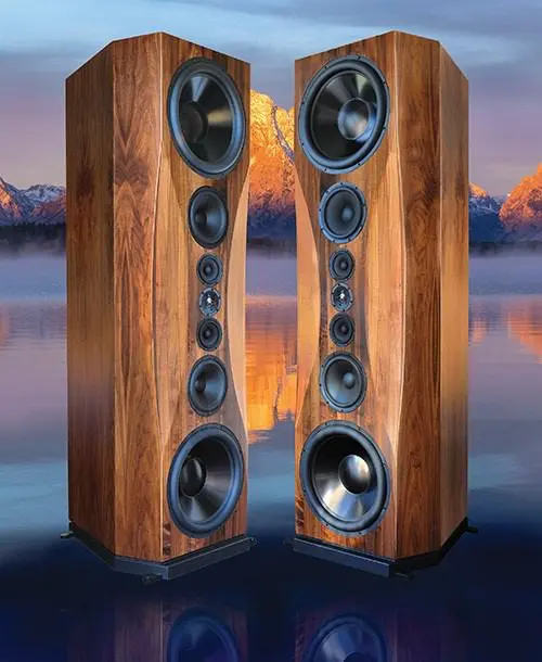 A pair of speakers sitting on top of a table.