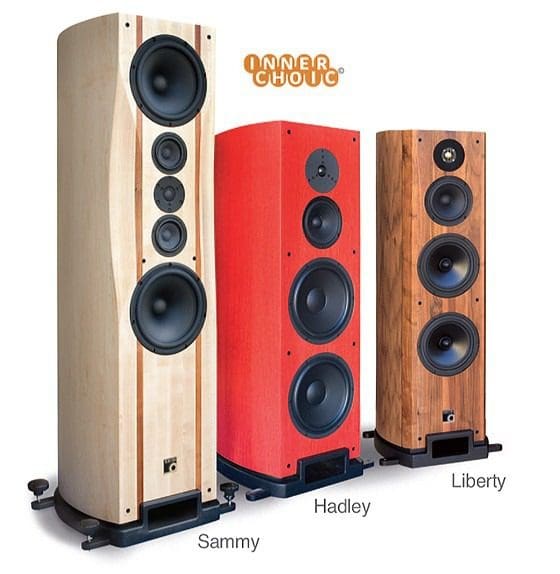 Three speakers are shown side by side with different colors.