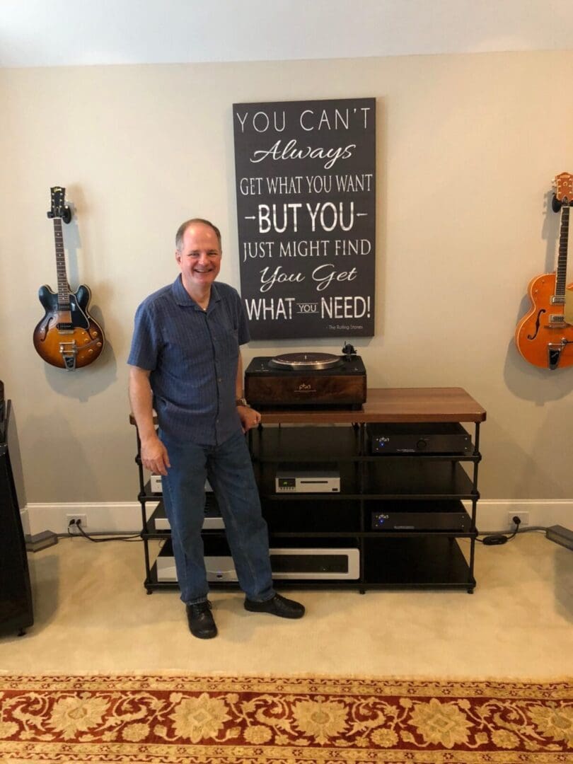 The Sound Station in Bartlesville client's new turntable and Peter Noerbaek.